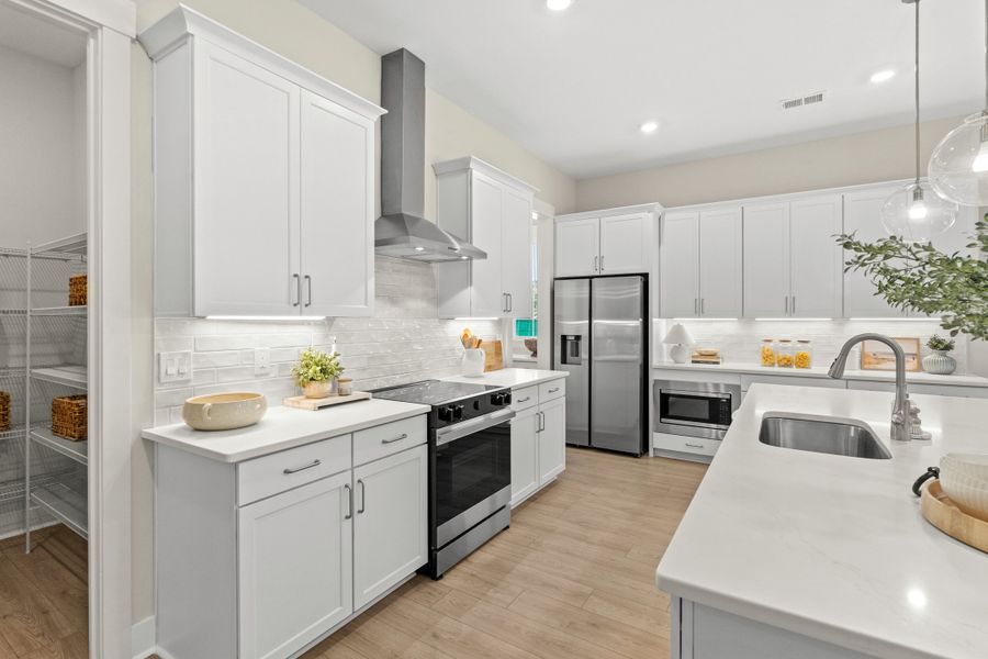 Furnished interior view inside a new home in Long Bay Golf Club, Longs (Image 11).
