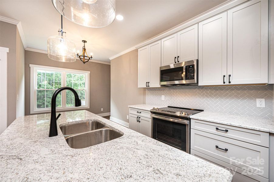 Furnished interior view inside a new home in , Lenoir (Image 8).