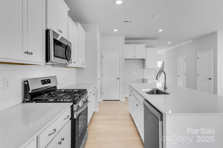 Furnished interior view inside a new home in Redhawk: Walk, Belmont (Image 12).