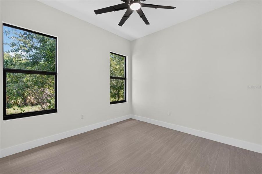 Spacious, unfurnished interior of a new home in , Port Charlotte (Image 24).