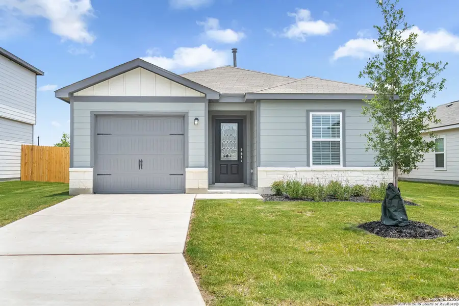 Front exterior of a new home in Luckey Ranch, San Antonio, TX, highlighting curb appeal (Image 1).