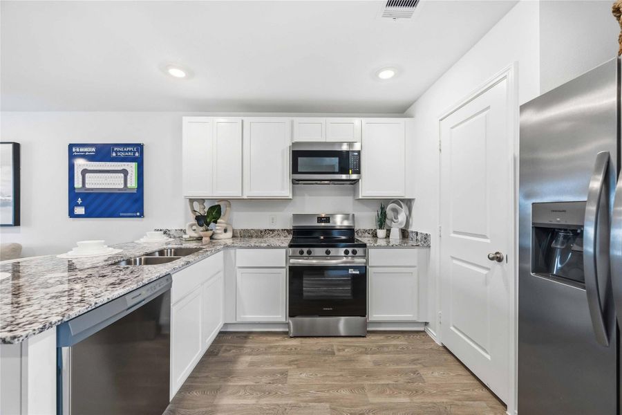 Furnished interior view inside a new home in Pineapple Square, Houston (Image 7).