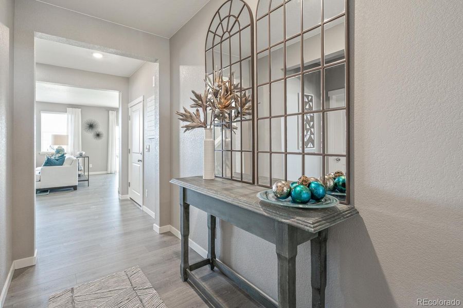 Furnished interior view inside a new home in Trails at Crowfoot, Parker (Image 20).