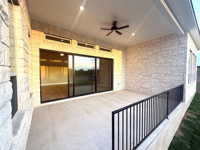 View of patio featuring a ceiling fan