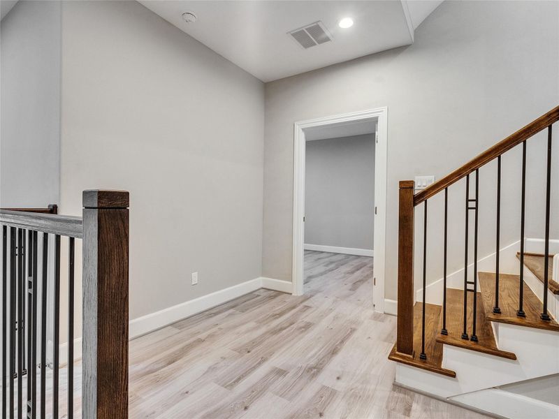 First floor landing and view of guest bedroom