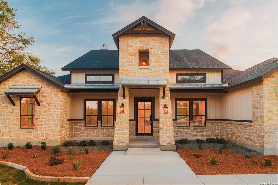 Front exterior of a new home in , La Vernia, TX, highlighting curb appeal (Image 20).