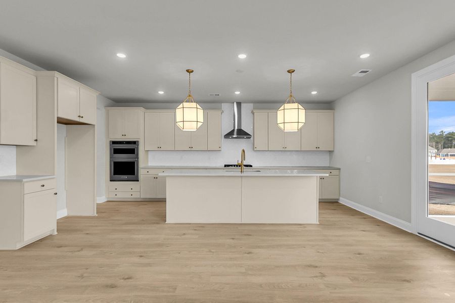 Furnished interior view inside a new home in Tidewater at Lakes of Cane Bay, Summerville (Image 8).