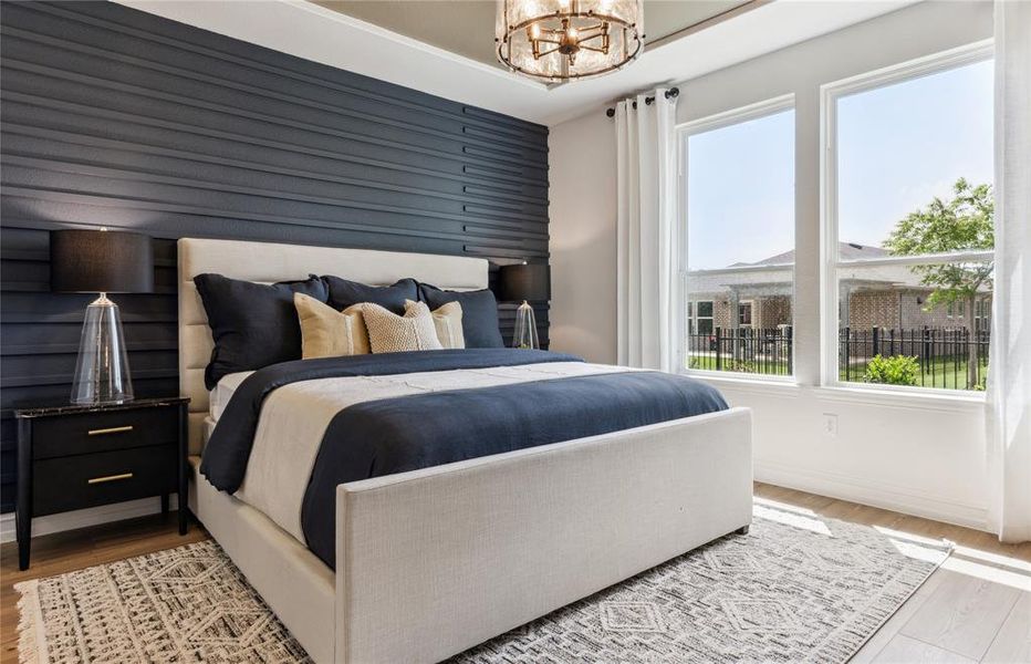 Spacious owner's suite with private bath *Model Representation*