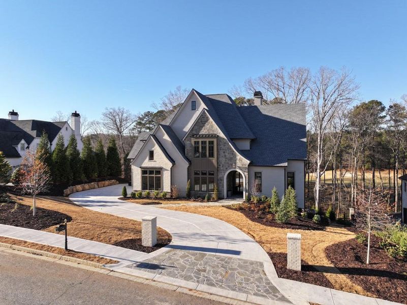 Front exterior of a new home in , Milton, GA, highlighting curb appeal (Image 36).
