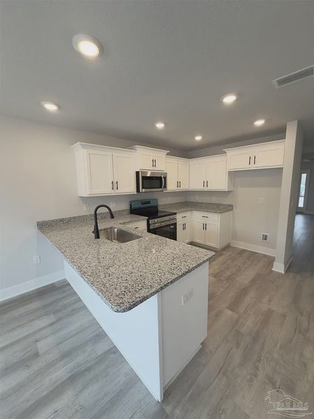 Furnished interior view inside a new home in Allison Acres, Cantonment (Image 4). Furnished interior view inside a new home in Allison Acres, Cantonment (Image 4).