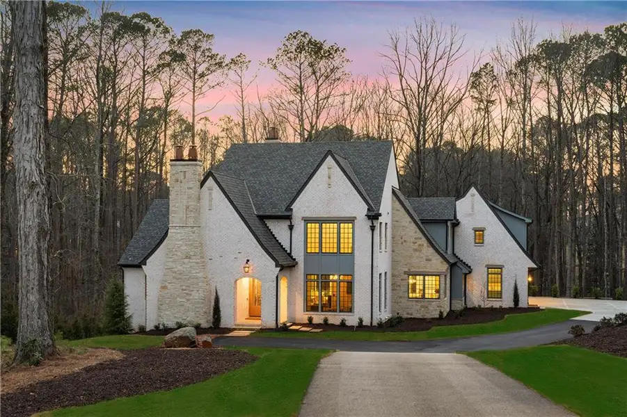 Front exterior of a new home in , Milton, GA, highlighting curb appeal (Image 1). Front exterior of a new home in , Milton, GA, highlighting curb appeal (Image 1).