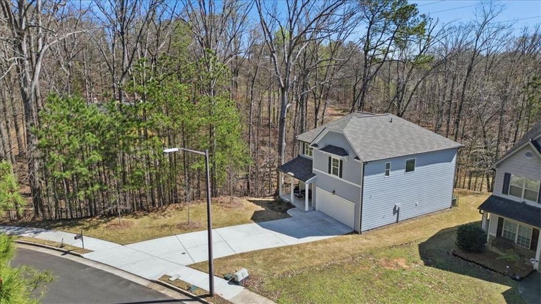 Front exterior of a new home in Tell River, Atlanta, GA, highlighting curb appeal (Image 26). Front exterior of a new home in Tell River, Atlanta, GA, highlighting curb appeal (Image 26).