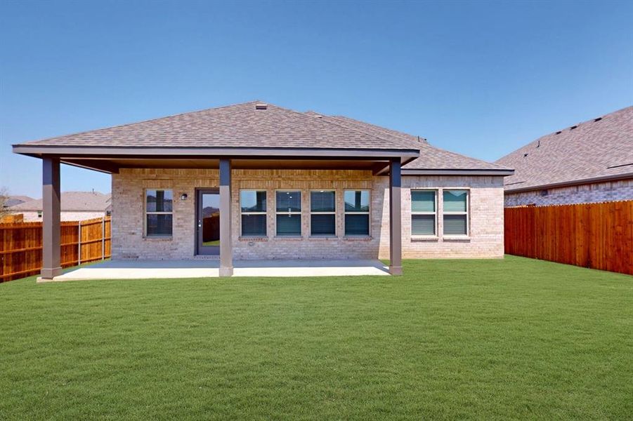 Front exterior of a new home in Sagebrook, Argyle, TX, highlighting curb appeal (Image 2). Front exterior of a new home in Sagebrook, Argyle, TX, highlighting curb appeal (Image 2).