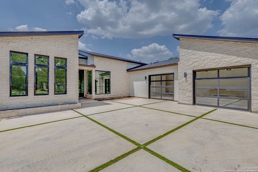 Front exterior of a new home in , San Antonio, TX, highlighting curb appeal (Image 21). Front exterior of a new home in , San Antonio, TX, highlighting curb appeal (Image 21).
