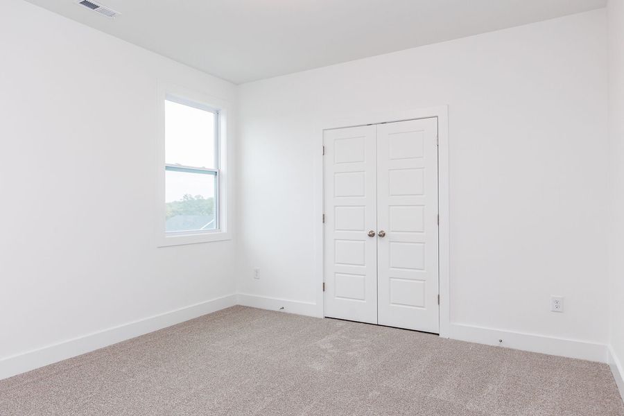 Spacious, unfurnished interior of a new home in High Grove Oaks, Fuquay Varina (Image 27).