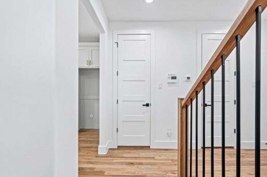 Hall with light wood-type flooring