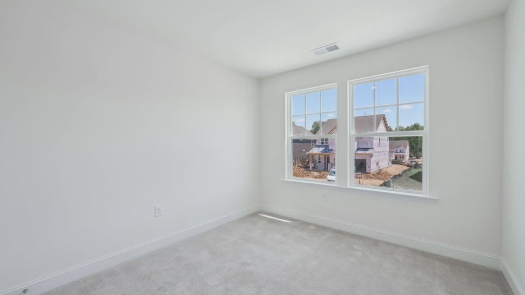 Furnished interior view inside a new home in Sidney Creek Single Family, Zebulon (Image 23).