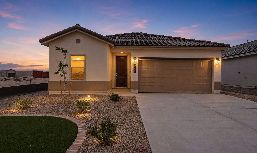 Front exterior of a new home in Paseos Del Este, Horizon City, TX, highlighting curb appeal (Image 25).