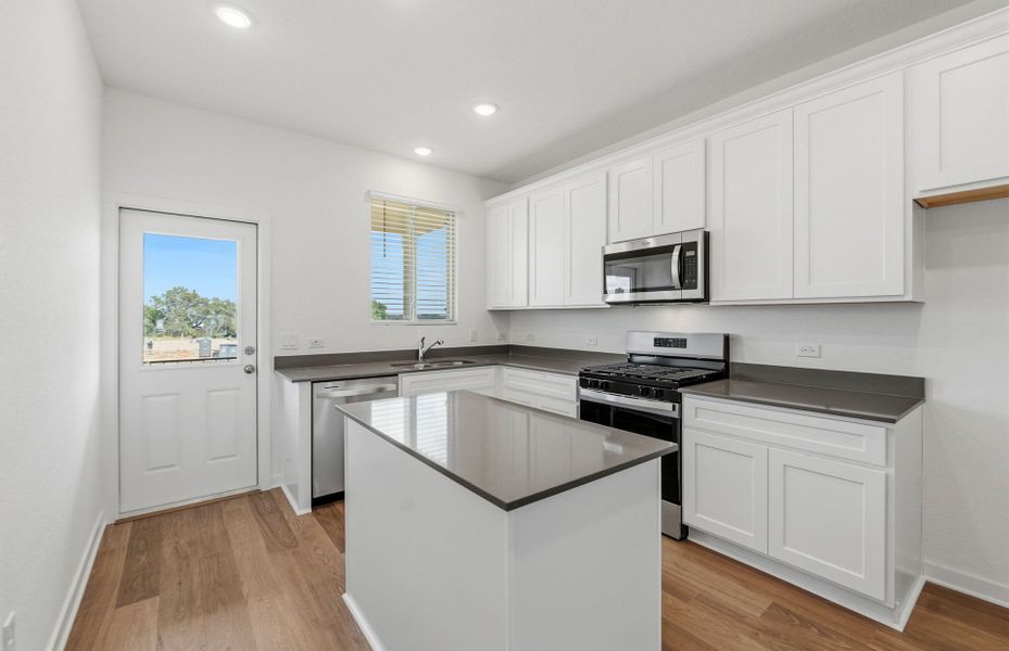 Furnished interior view inside a new home in La Cima, San Marcos (Image 10).