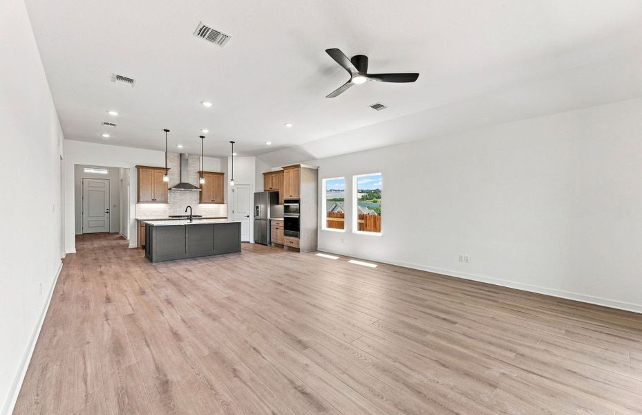 Representative unfurnished interior of a home built from the Elliott by Pulte Homes in West Cypress Hills, Spicewood (Image 29).
