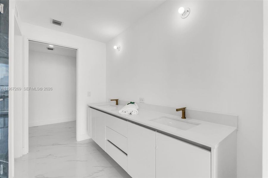 Furnished interior view inside a new home in , Miami (Image 19). Furnished interior view inside a new home in , Miami (Image 19).