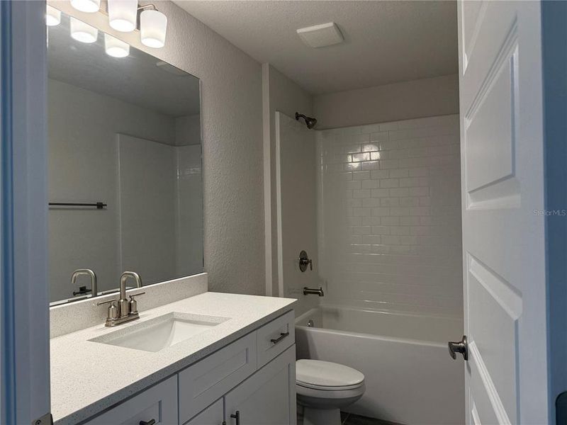 Furnished interior view inside a new home in Watercress Cove, North Port (Image 6).