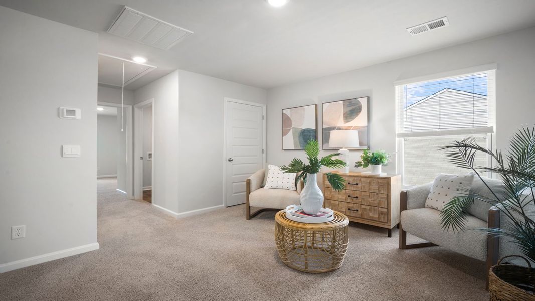 Furnished interior view inside a new home in The Lakes at North Glynn, Brunswick (Image 15).