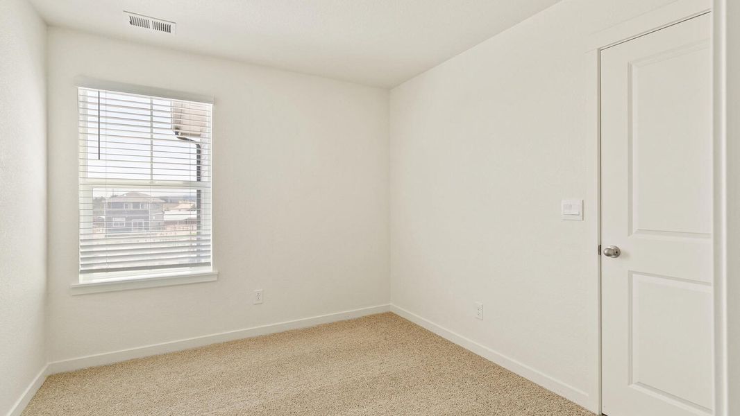 Representative unfurnished interior of a home built from the Lark by D.R. Horton in The Ridge at Lorson Ranch, Colorado Springs (Image 23).