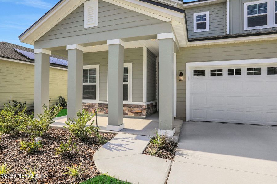 Exterior details and patio area of a home in Hyland Trail, Green Cove Springs (Image 33).