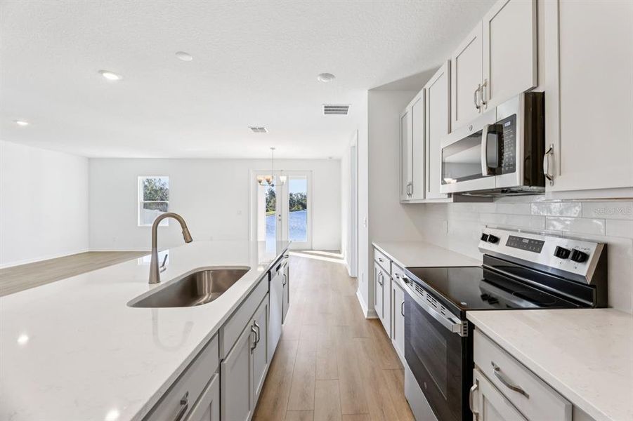 Furnished interior view inside a new home in Ellington Traditional, St. Cloud (Image 8). Furnished interior view inside a new home in Ellington Traditional, St. Cloud (Image 8).