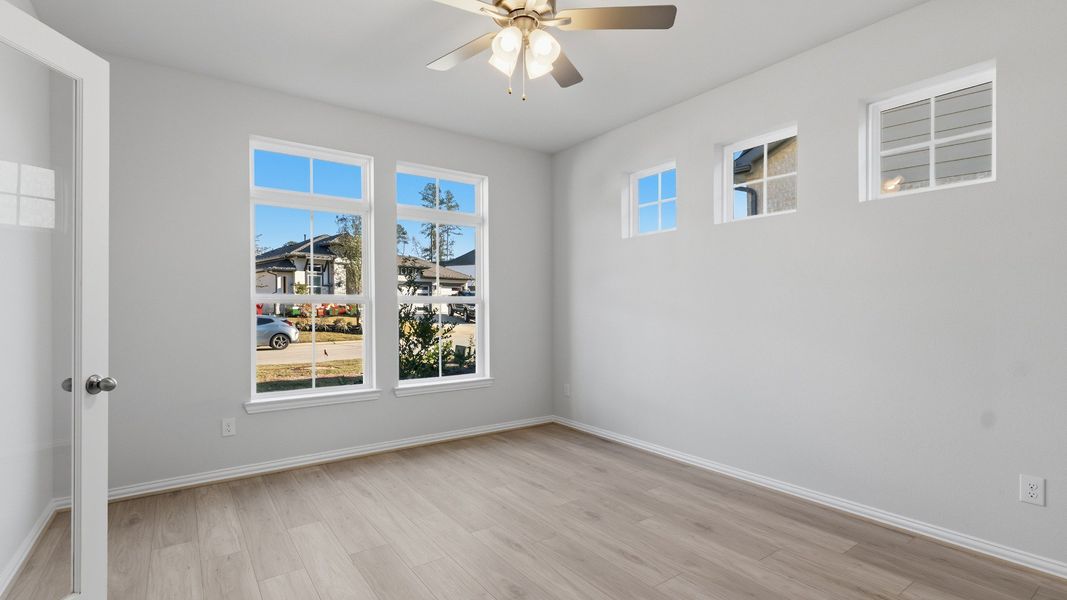 Furnished interior view inside a new home in The Woodlands Hills, Willis (Image 8).