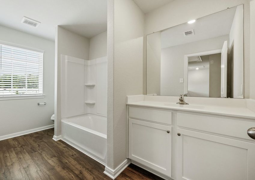 Second bathroom with a shower/tub combination
