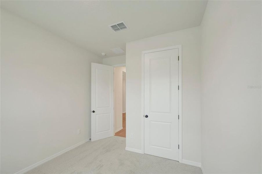 Spacious, unfurnished interior of a new home in Waterset Tradition Series, Apollo Beach (Image 19).