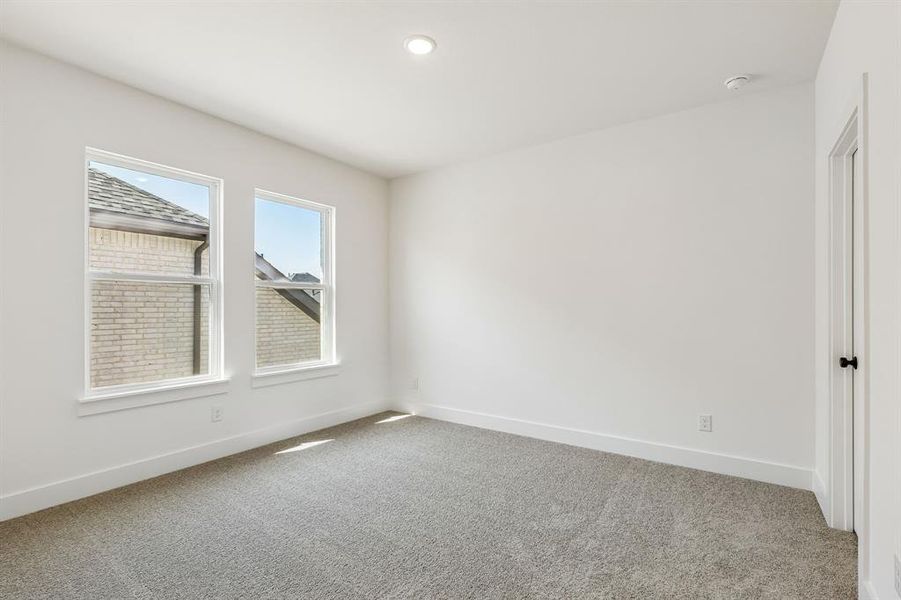 You'll enjoy nicely sized secondary bedrooms in our Justin plan.