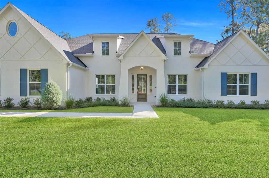 This stunning home has sophisticated trim details, a grand entrance, dormer windows and designer colors. This stunning home has sophisticated trim details, a grand entrance, dormer windows and designer colors.
