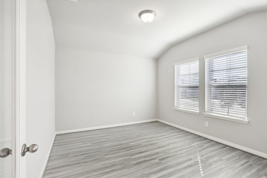 Guest bedroom in the Oleander floorplan at a Meritage Homes community. Guest bedroom in the Oleander floorplan at a Meritage Homes community.