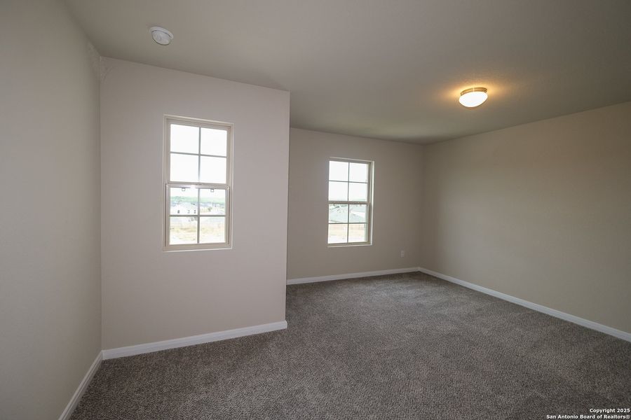 Spacious, unfurnished interior of a new home in Hunters Ranch, San Antonio (Image 36).