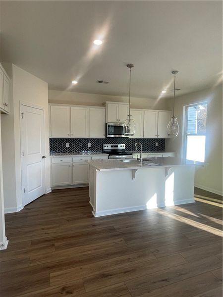 Furnished interior view inside a new home in Springwood Grove, Central (Image 5).