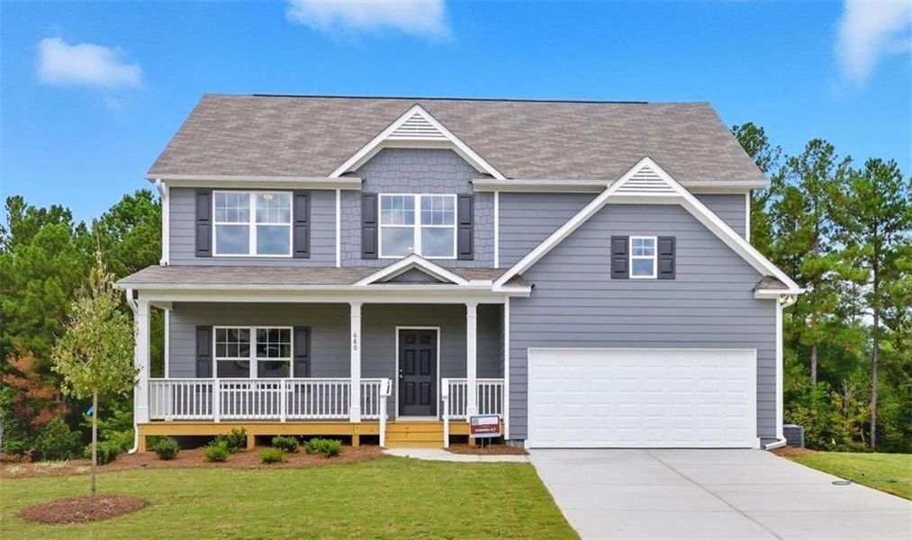 Front exterior of a new home in Creekside Landing, Dallas, GA, highlighting curb appeal (Image 2).