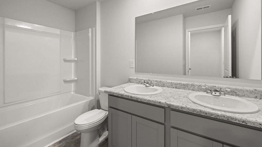 Representative furnished interior of a home built from the BELHAVEN by D.R. Horton in Northberry, Rome (Image 10).