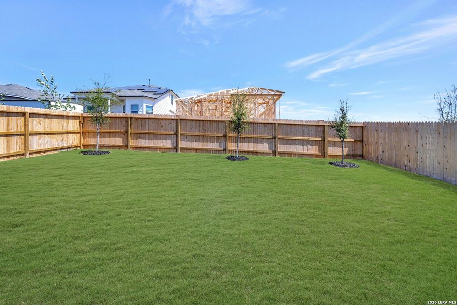 Exterior details and patio area of a home in Mesquite Ridge, San Antonio (Image 3).