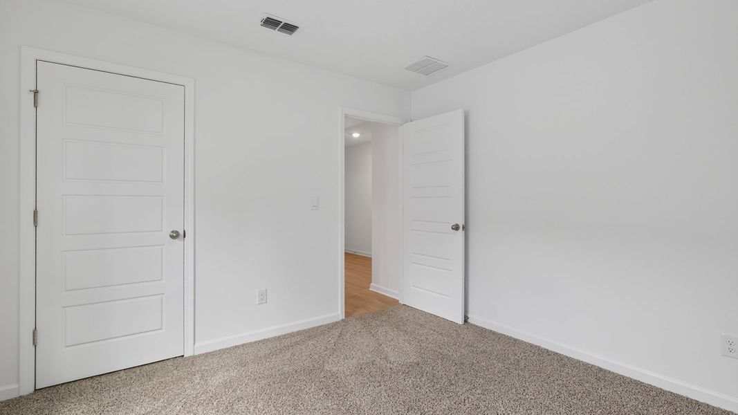 Representative unfurnished interior of a home built from the Aria+ by D.R. Horton in The Arbors, Jacksonville (Image 26).