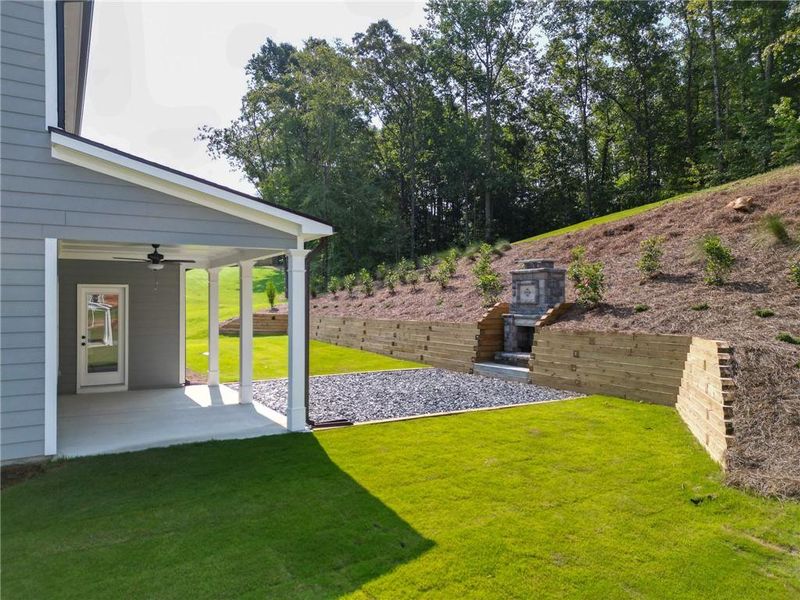 Exterior details and patio area of a home in Woodland Hills, Loganville (Image 3).