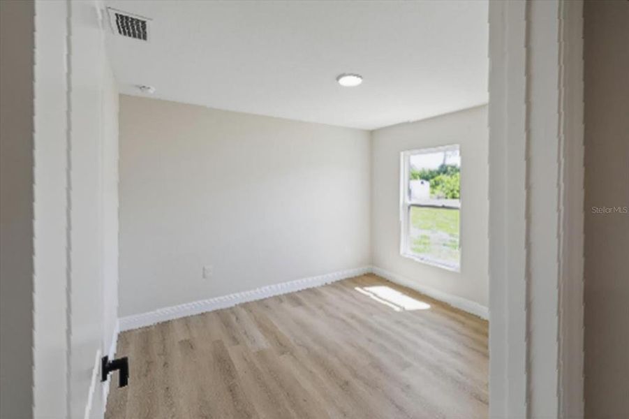 Spacious, unfurnished interior of a new home in , Port Charlotte (Image 17).
