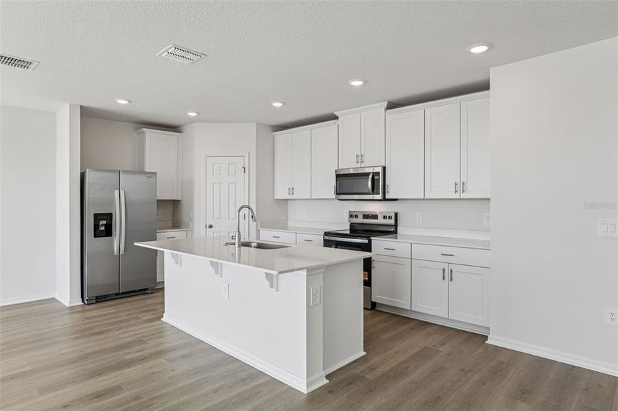 Furnished interior view inside a new home in Lake Deer Estates - Signature Series, Poinciana (Image 10).