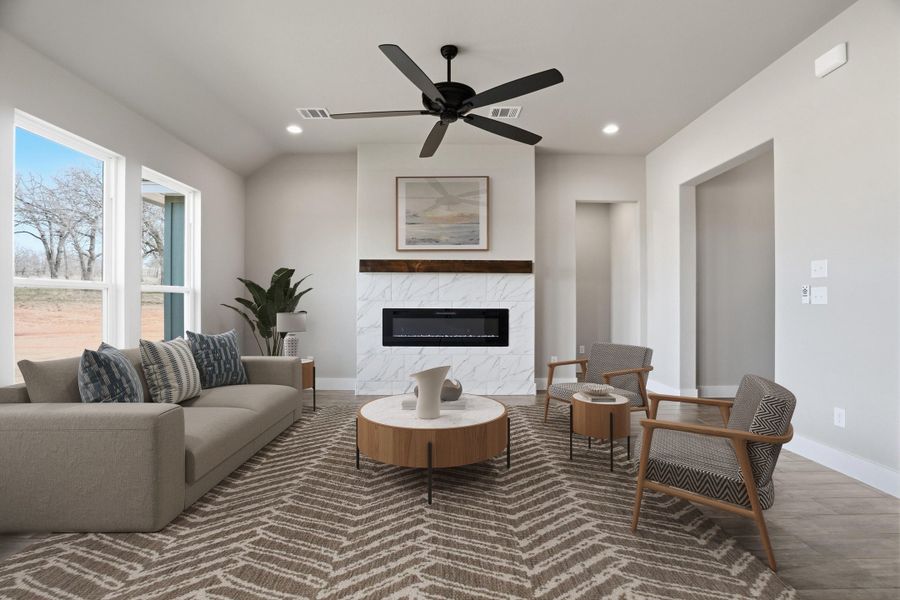 Representative furnished interior of a home built from the The Petunia by Kenmark Homes in Zion Valley, Poolville (Image 5).