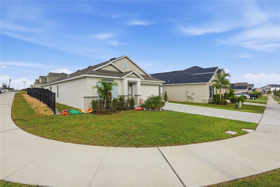 Front exterior of a new home in Bellaviva I at Westside, Davenport, FL, highlighting curb appeal (Image 1).