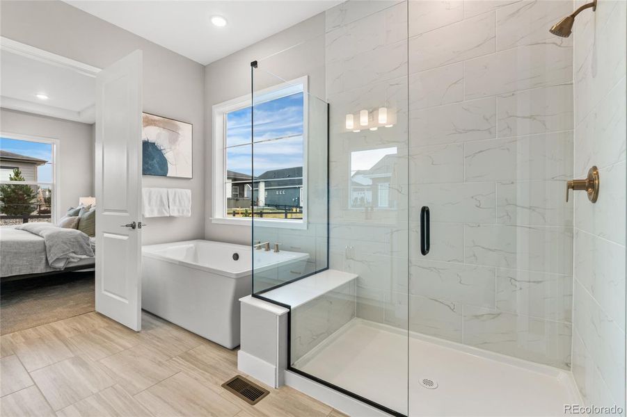 Furnished interior view inside a new home in Hilltop at Inspiration, Aurora (Image 5).