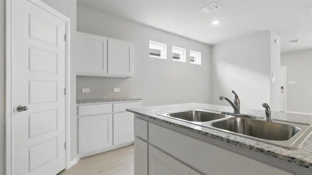 Furnished interior view inside a new home in Orchard Village, Fort Worth (Image 11). Furnished interior view inside a new home in Orchard Village, Fort Worth (Image 11).