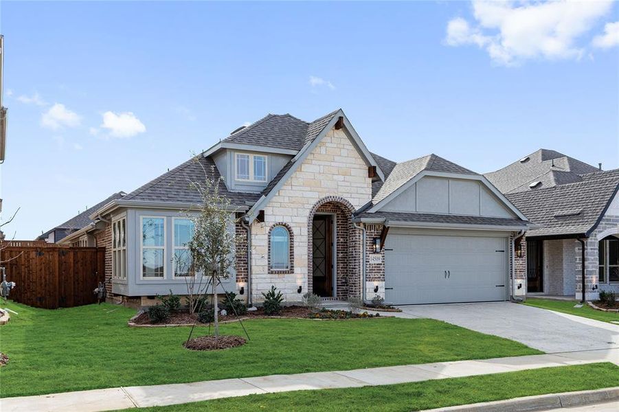 Front exterior of a new home in Creekview Meadows, Pilot Point, TX, highlighting curb appeal (Image 1). Front exterior of a new home in Creekview Meadows, Pilot Point, TX, highlighting curb appeal (Image 1).